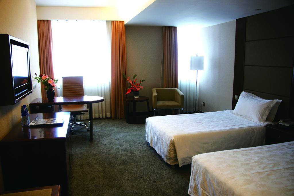 New Gloria Plaza Garden Hotel Harbin Camera foto